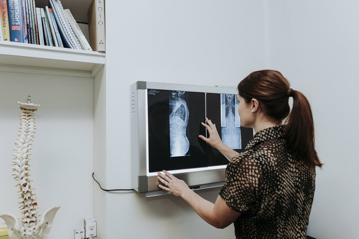 Going over x-ray results during the second chiropractic visit.